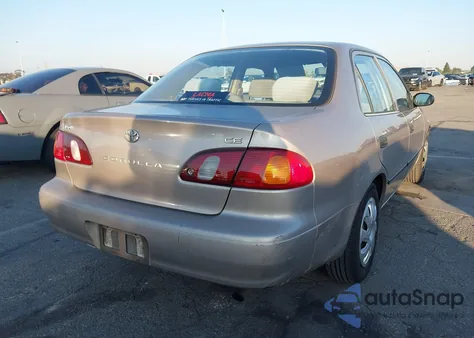 2000 Toyota Corolla Ce from USA, damaged, VIN 1NXBR12E4YZ358411
